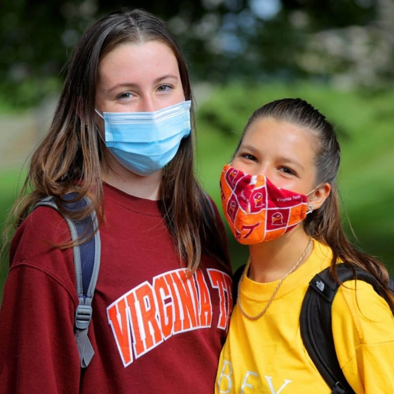 Two Virginia Tech students wearing masks