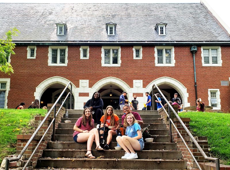 Current students sit with Dean Knox